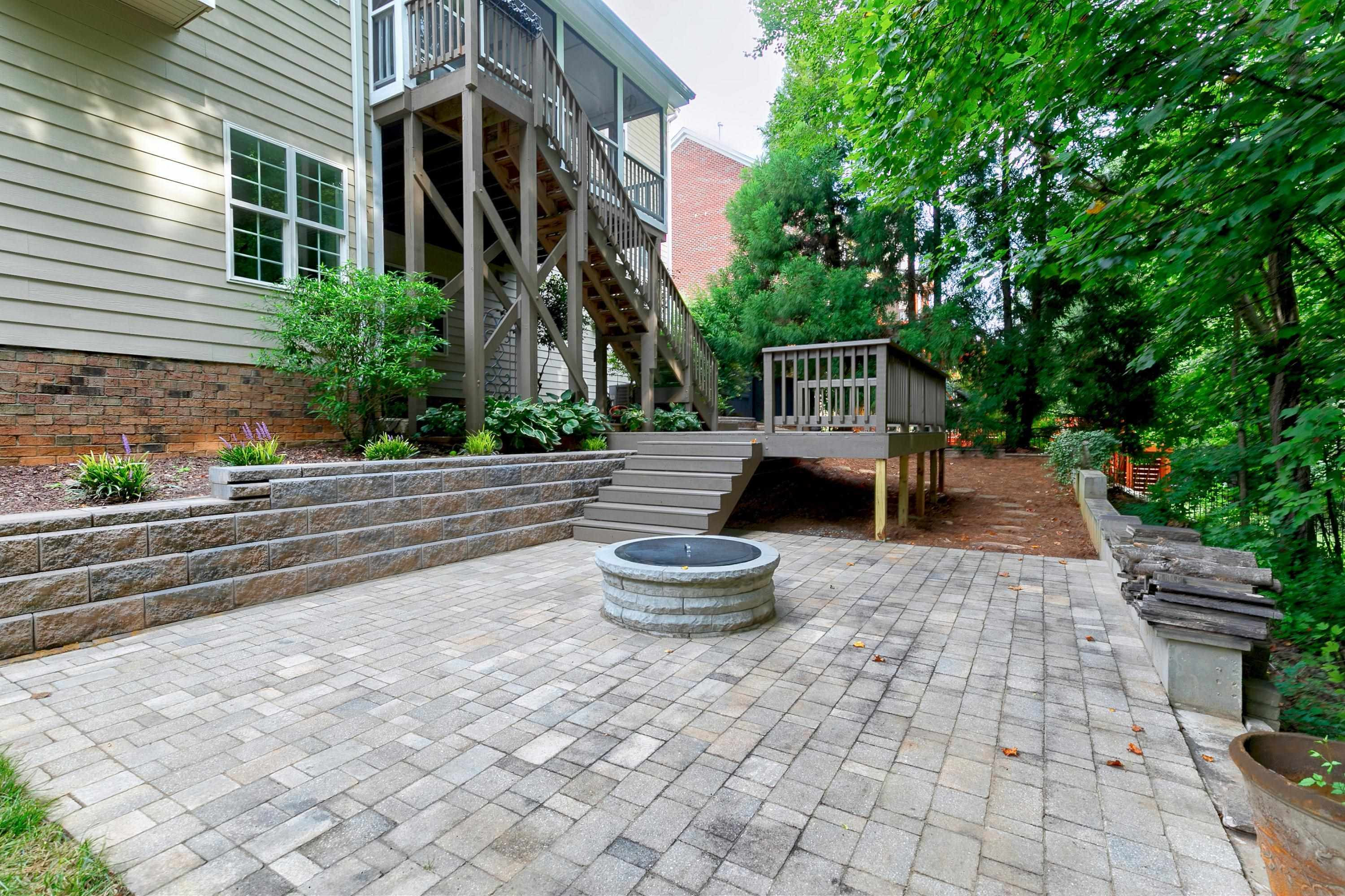 8431 Henderson Road Apex, NC 27539 - Photo 49 of 56 a front view of a house with fountain