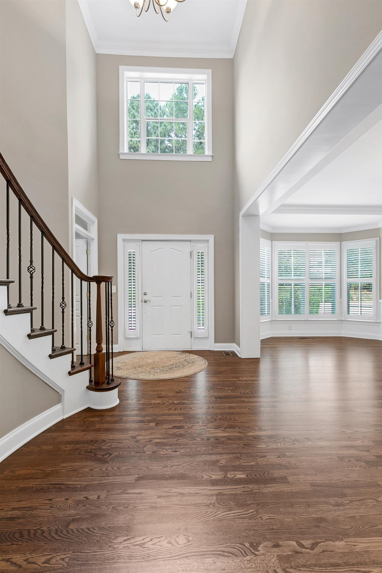 8431 Henderson Road Apex, NC 27539 - Photo 9 of 56 a view of an entryway with wooden floor