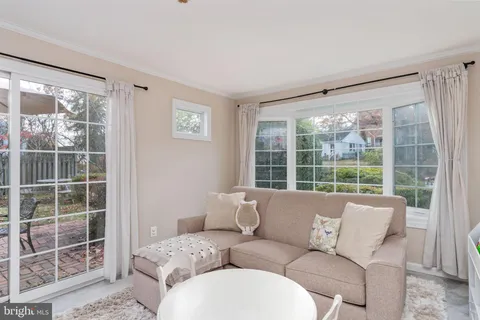 a large white bed in a white room