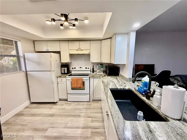 $133,000 | 2133 Golfside Village Drive, Lehigh Acres, FL 33936