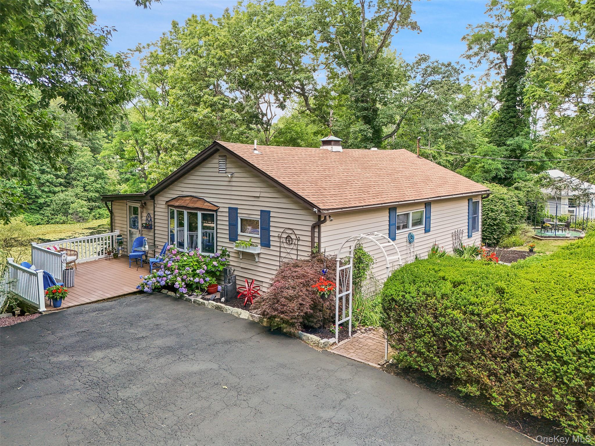 18 Sylvan Road Lake Peekskill, NY 10537 - Photo 1 of 50 Welcome to 18 Sylvan Rd, a slice of heaven in Putnam Valley