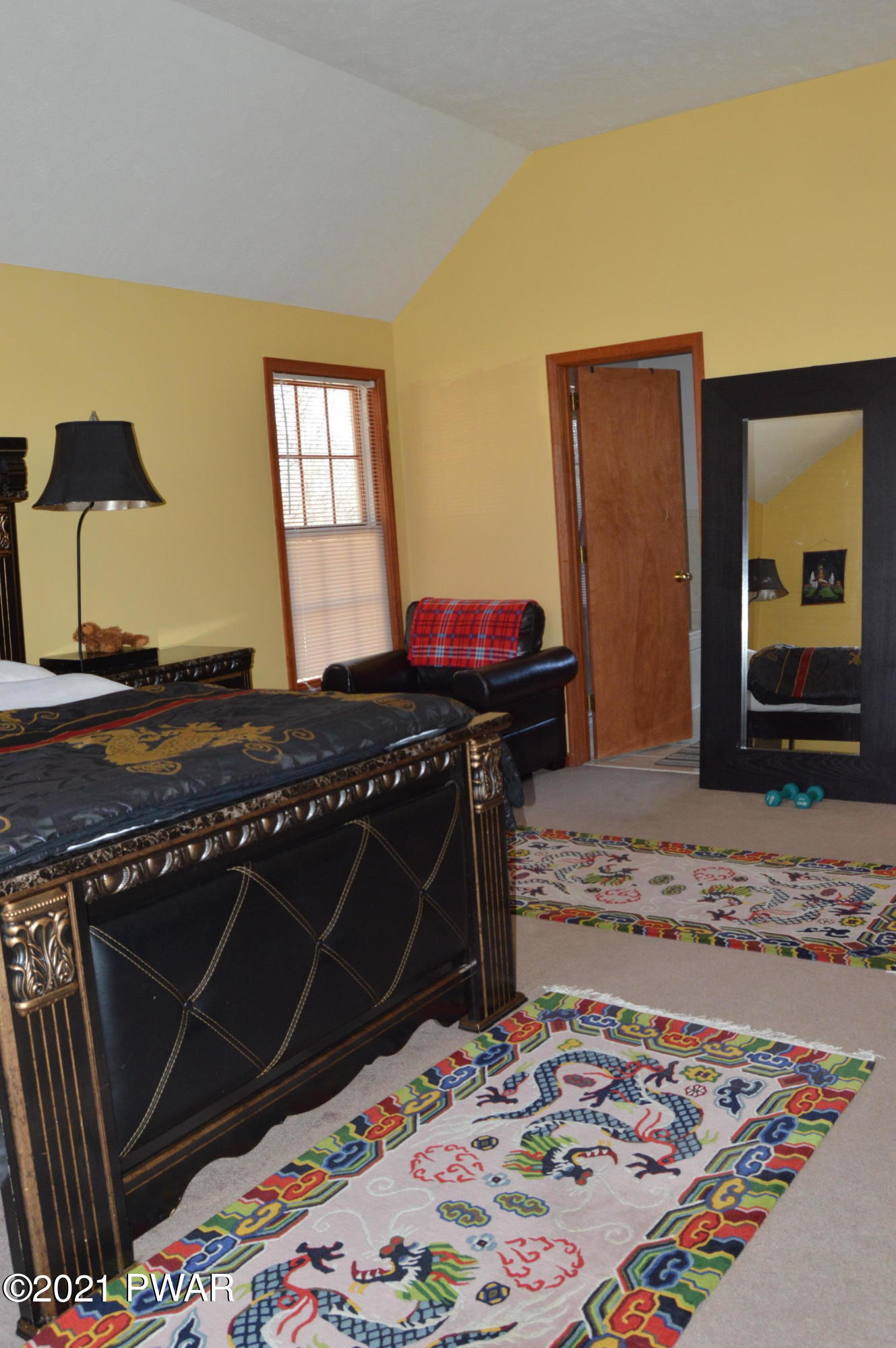 4281 Pne Rdg Drive Bushkill, PA 18324 - Photo 18 of 30 a bedroom with a bed and a dresser