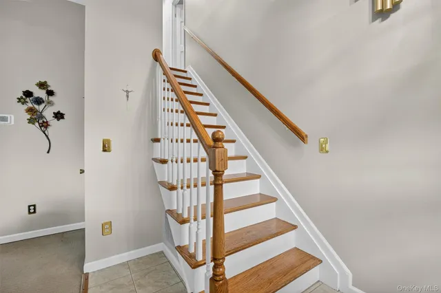 a view of storage and utility room with washer and dryer