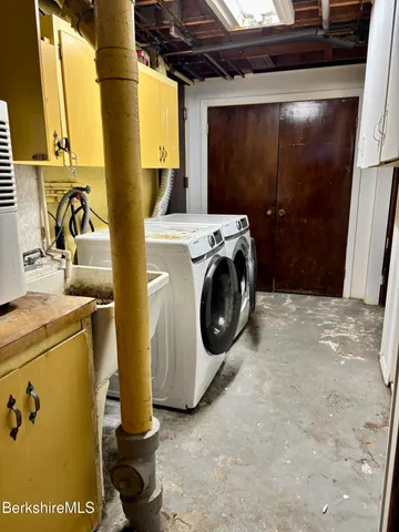 a view of storage and utility room