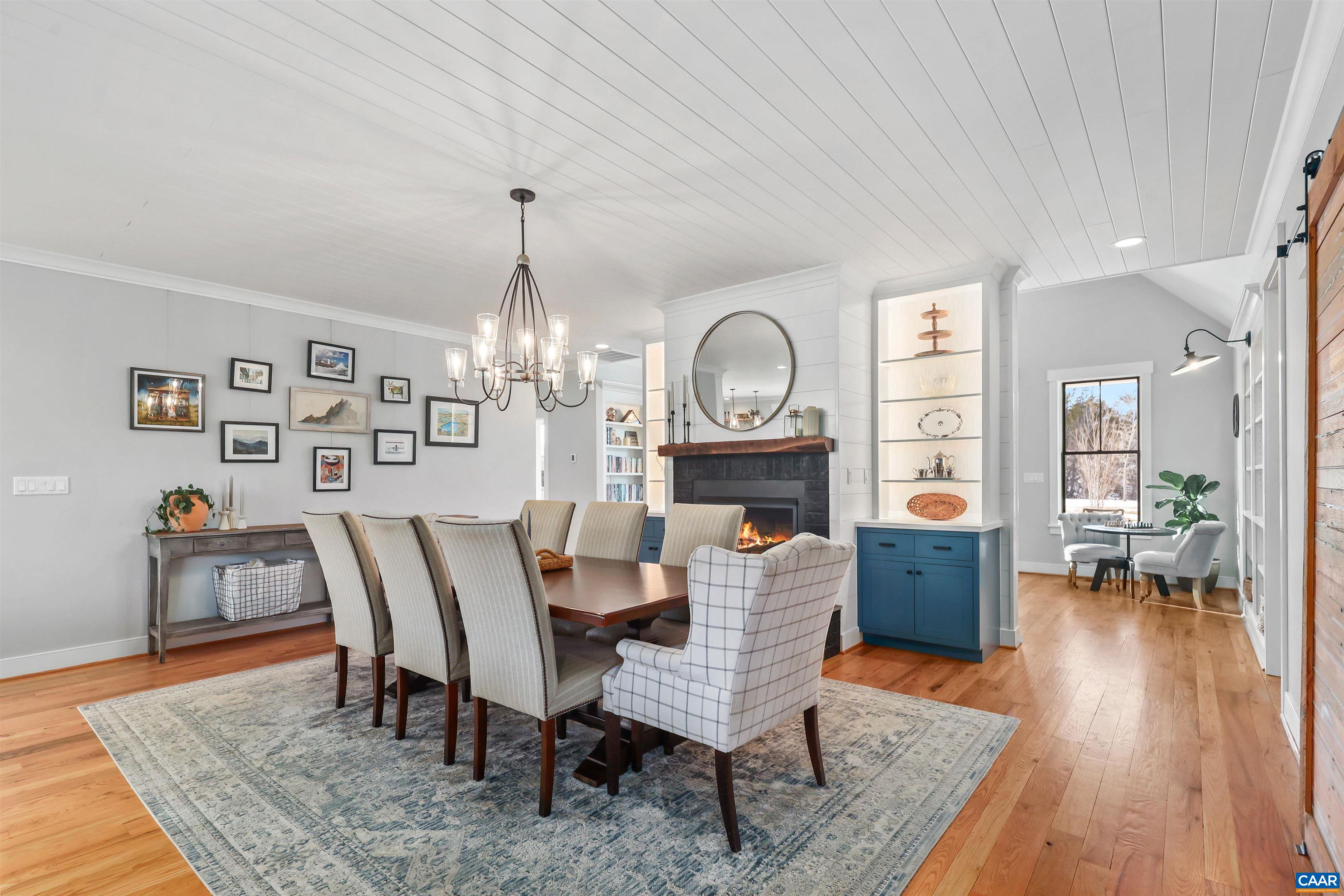5797 Advance Mills Road Advance Mills, VA 22968 - Photo 11 of 70 a view of a dining room with furniture and wooden floor