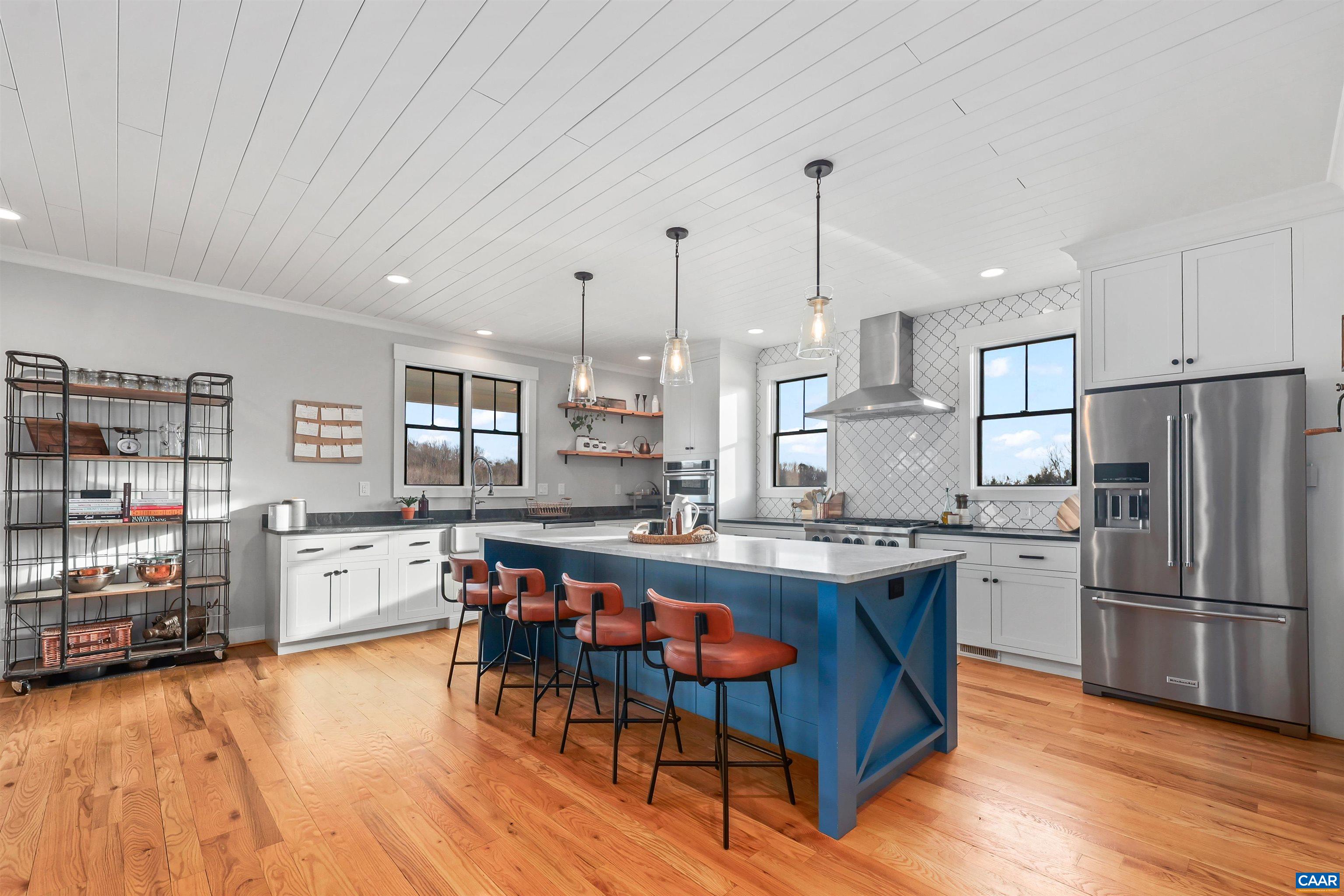 5797 Advance Mills Road Advance Mills, VA 22968 - Photo 15 of 70 a large kitchen with lots of counter space and appliances