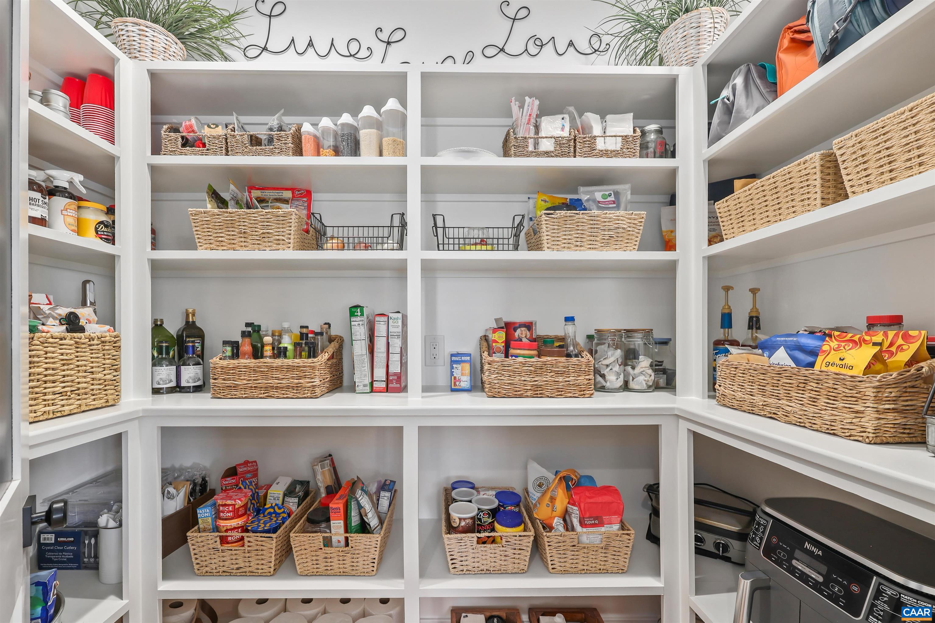 5797 Advance Mills Road Advance Mills, VA 22968 - Photo 20 of 70 a living room with lots of clutter and flowers