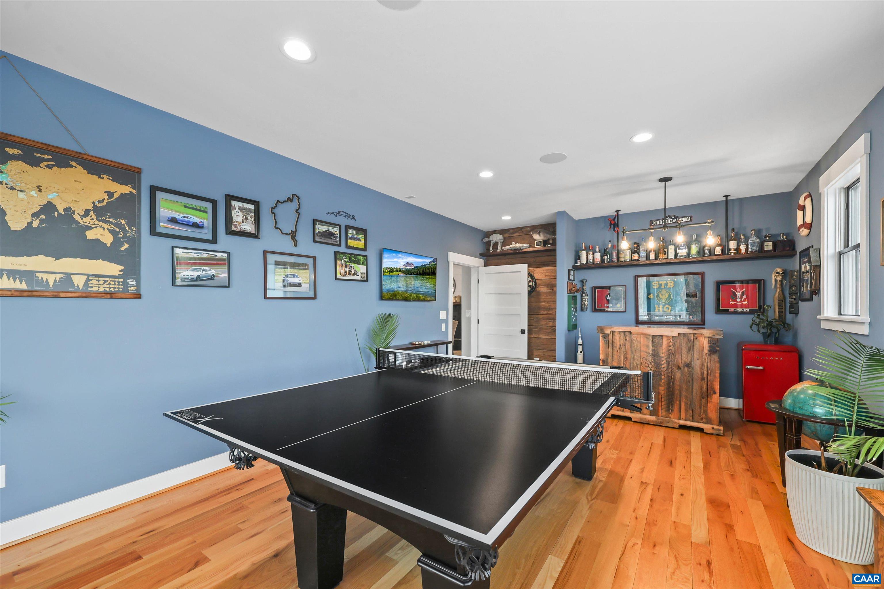 5797 Advance Mills Road Advance Mills, VA 22968 - Photo 22 of 70 a kitchen with stainless steel appliances granite countertop a refrigerator a stove and white cabinets with wooden floor
