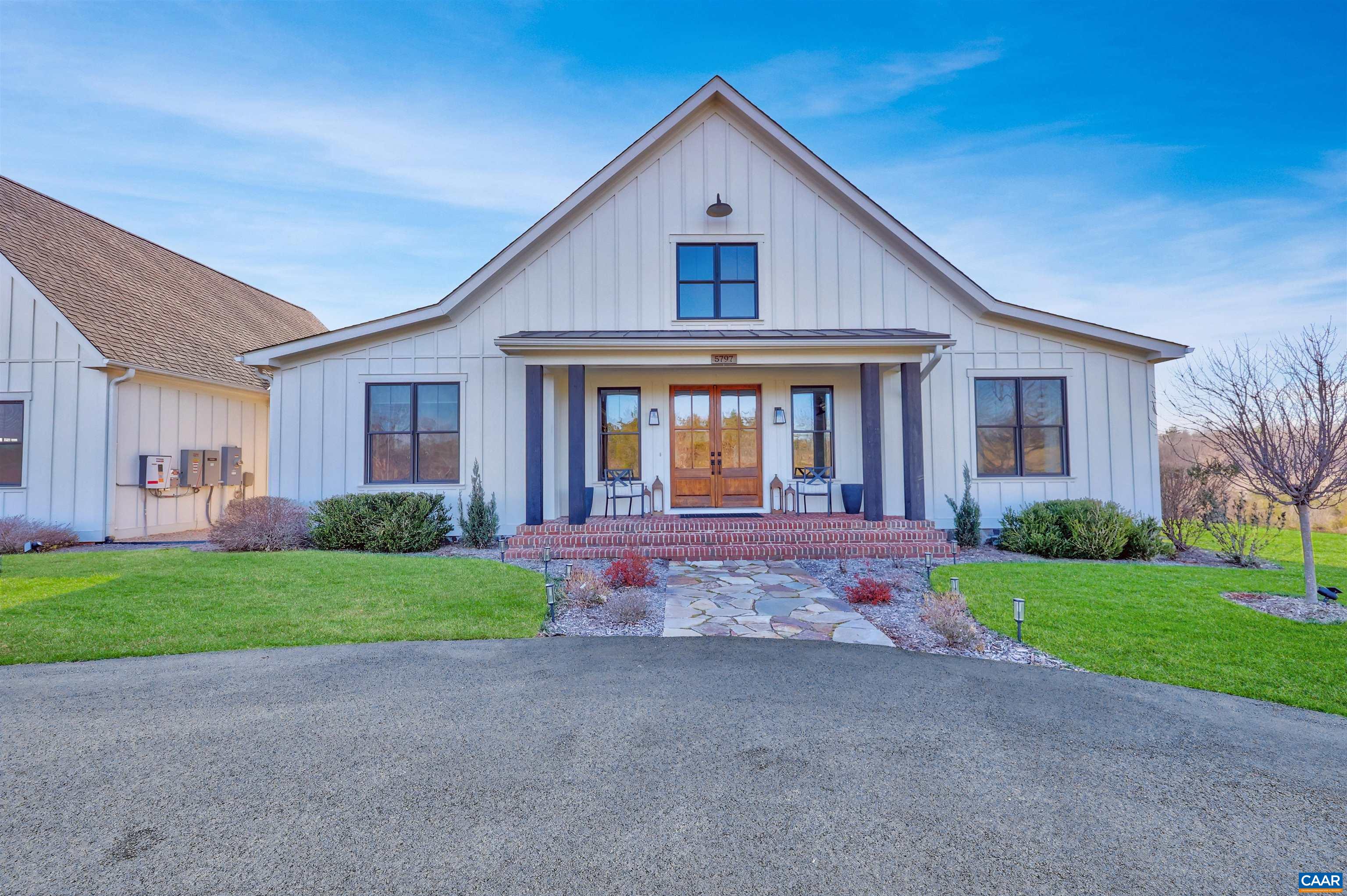 5797 Advance Mills Road Advance Mills, VA 22968 - Photo 3 of 70 a front view of house with yard and green space