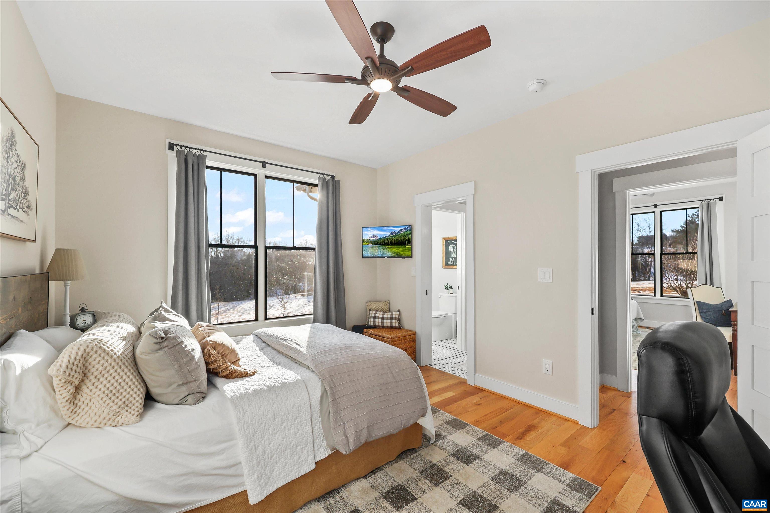 5797 Advance Mills Road Advance Mills, VA 22968 - Photo 34 of 70 a bedroom with a bed and a large window