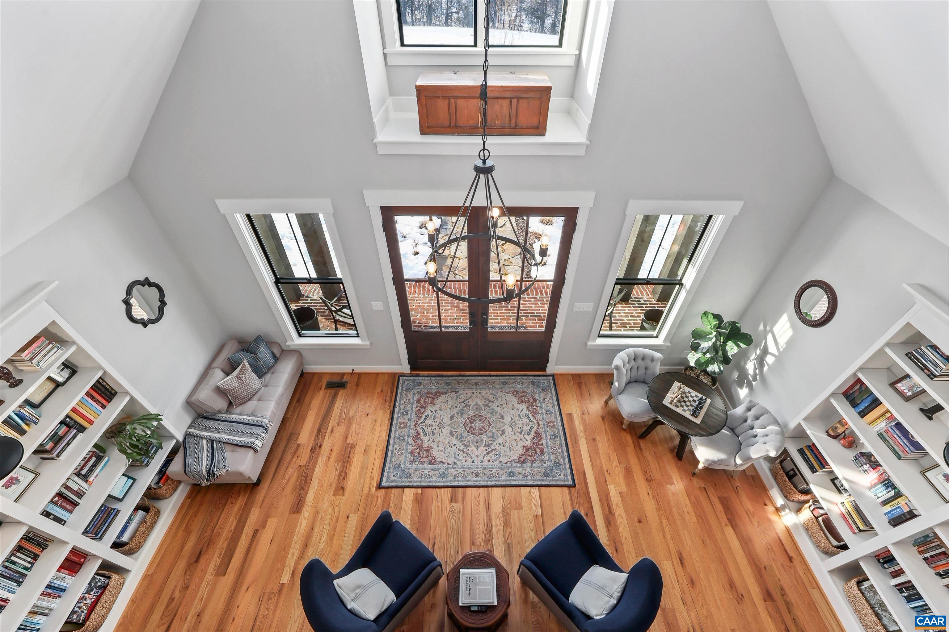 5797 Advance Mills Road Advance Mills, VA 22968 - Photo 38 of 70 a living room with furniture and a wooden floor
