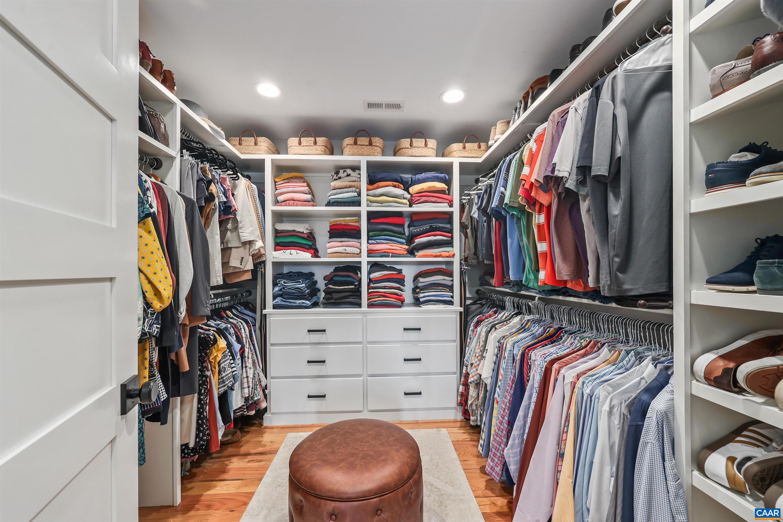 5797 Advance Mills Road Advance Mills, VA 22968 - Photo 45 of 70 a view of walk in closet with clothes and shoes