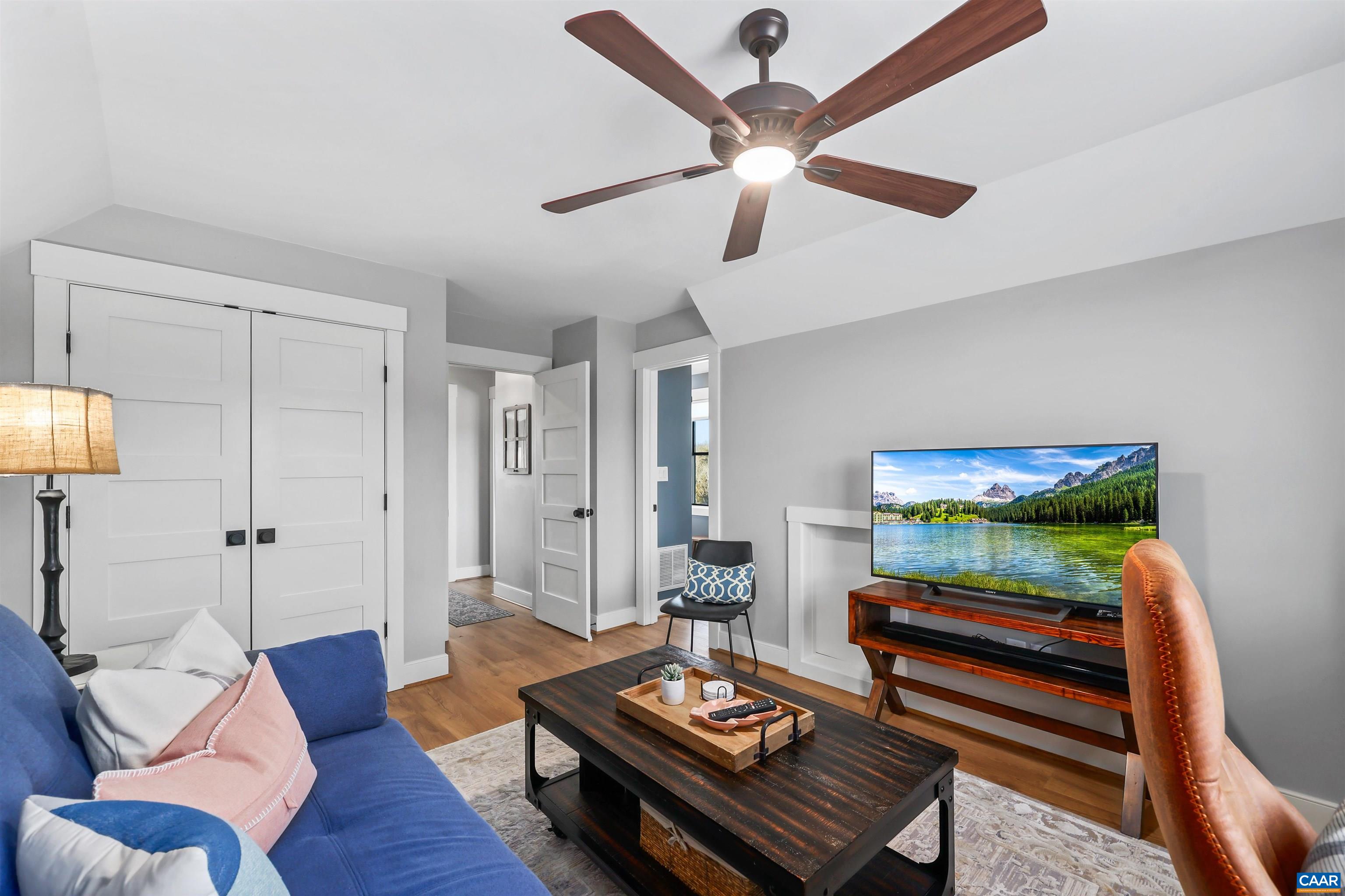 5797 Advance Mills Road Advance Mills, VA 22968 - Photo 52 of 70 a living room with furniture and a wooden floor