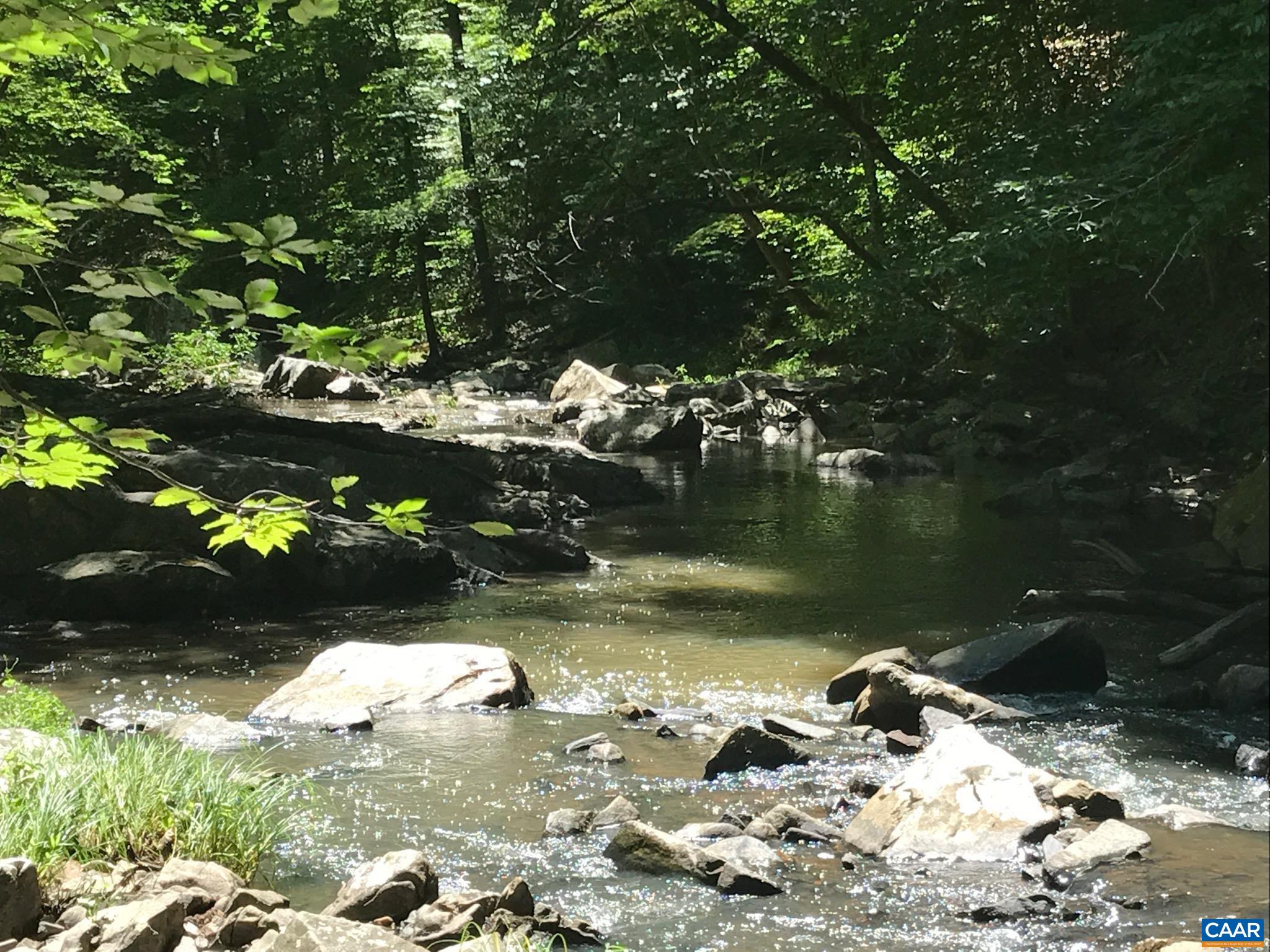 5797 Advance Mills Road Advance Mills, VA 22968 - Photo 67 of 70 a view of a lake from a yard