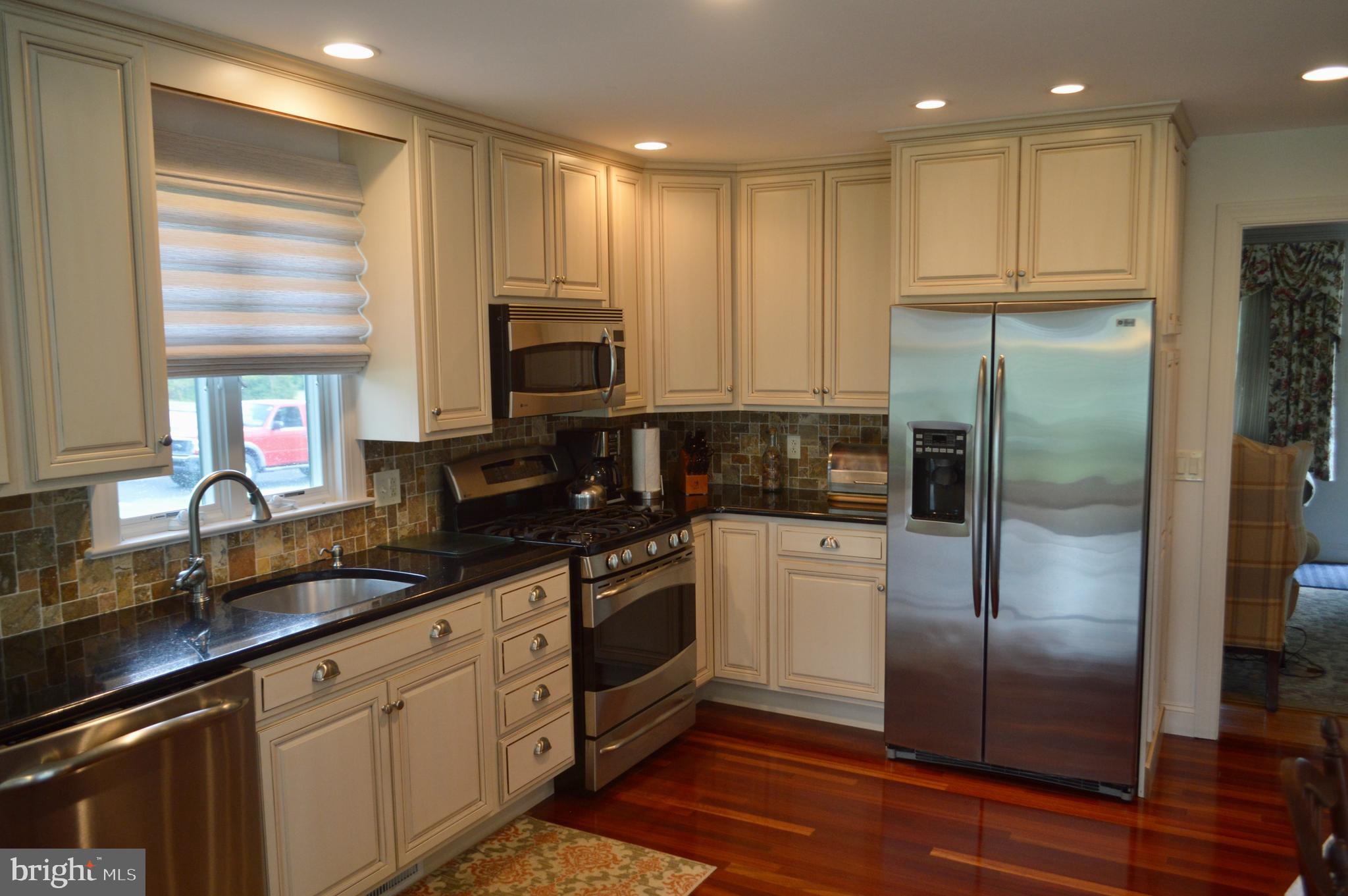 105 Brant Road Norristown, PA 19403 - Photo 5 of 25 Granite countertops. GE Profile S/S appliances.
