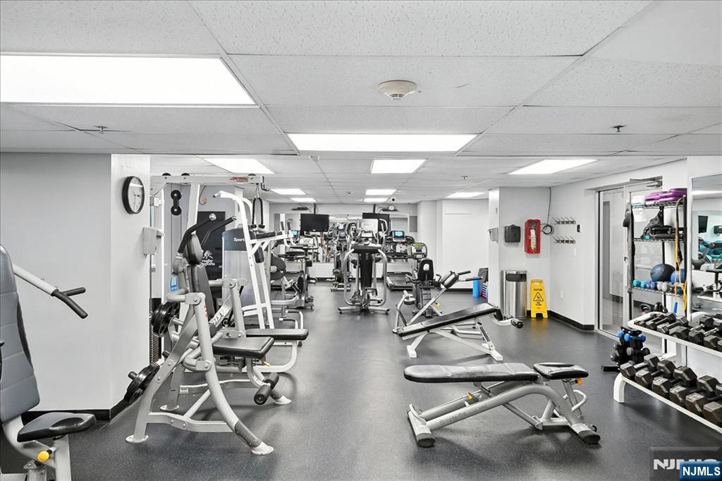 6600 JFK Boulevard East, Unit 18L West New York, NJ 07093 - Photo 24 of 36 a view of a room with gym equipment