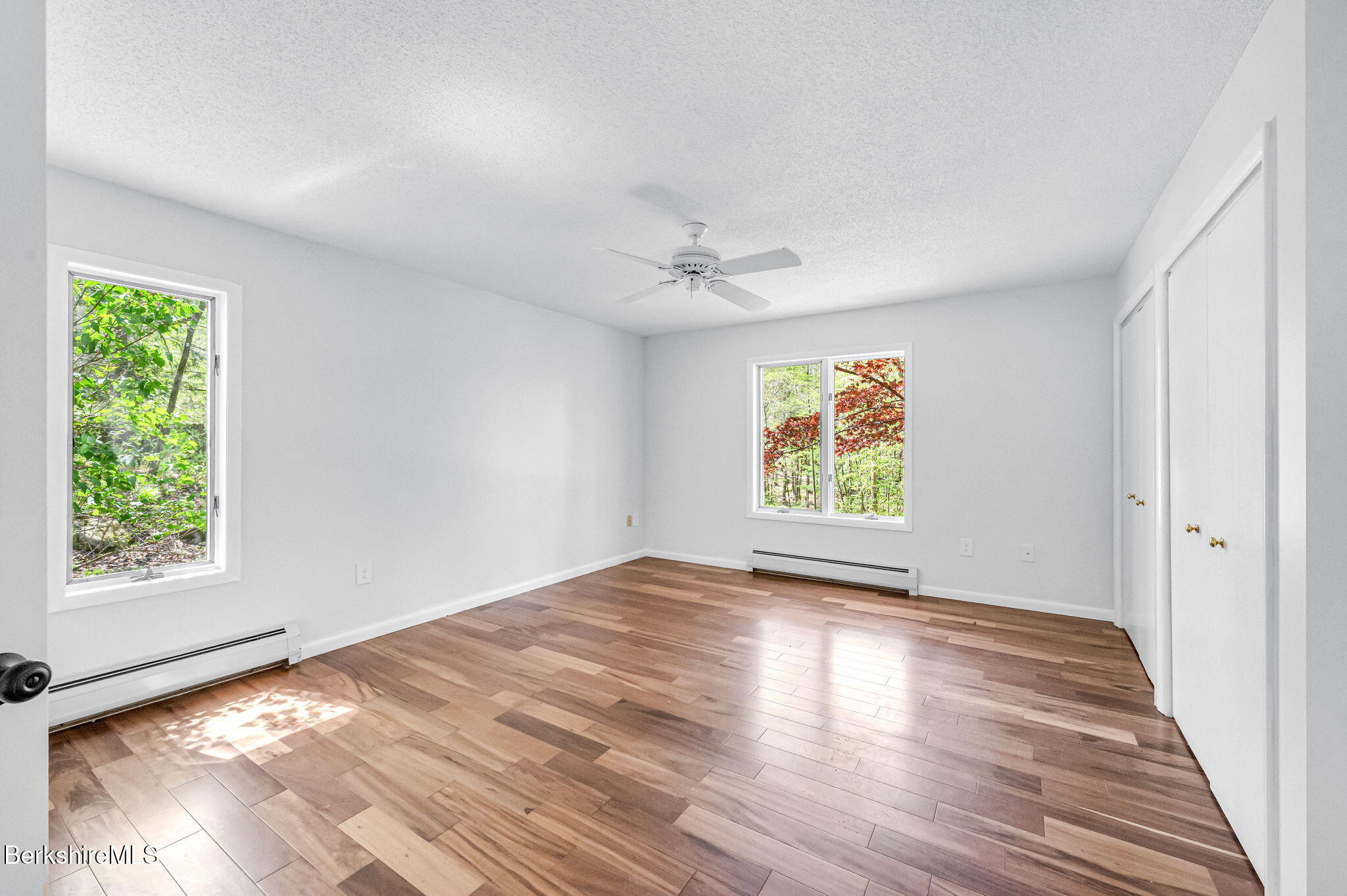 1874 Home Road Sheffield, MA 01230 - Photo 31 of 42 an empty room with windows and closet