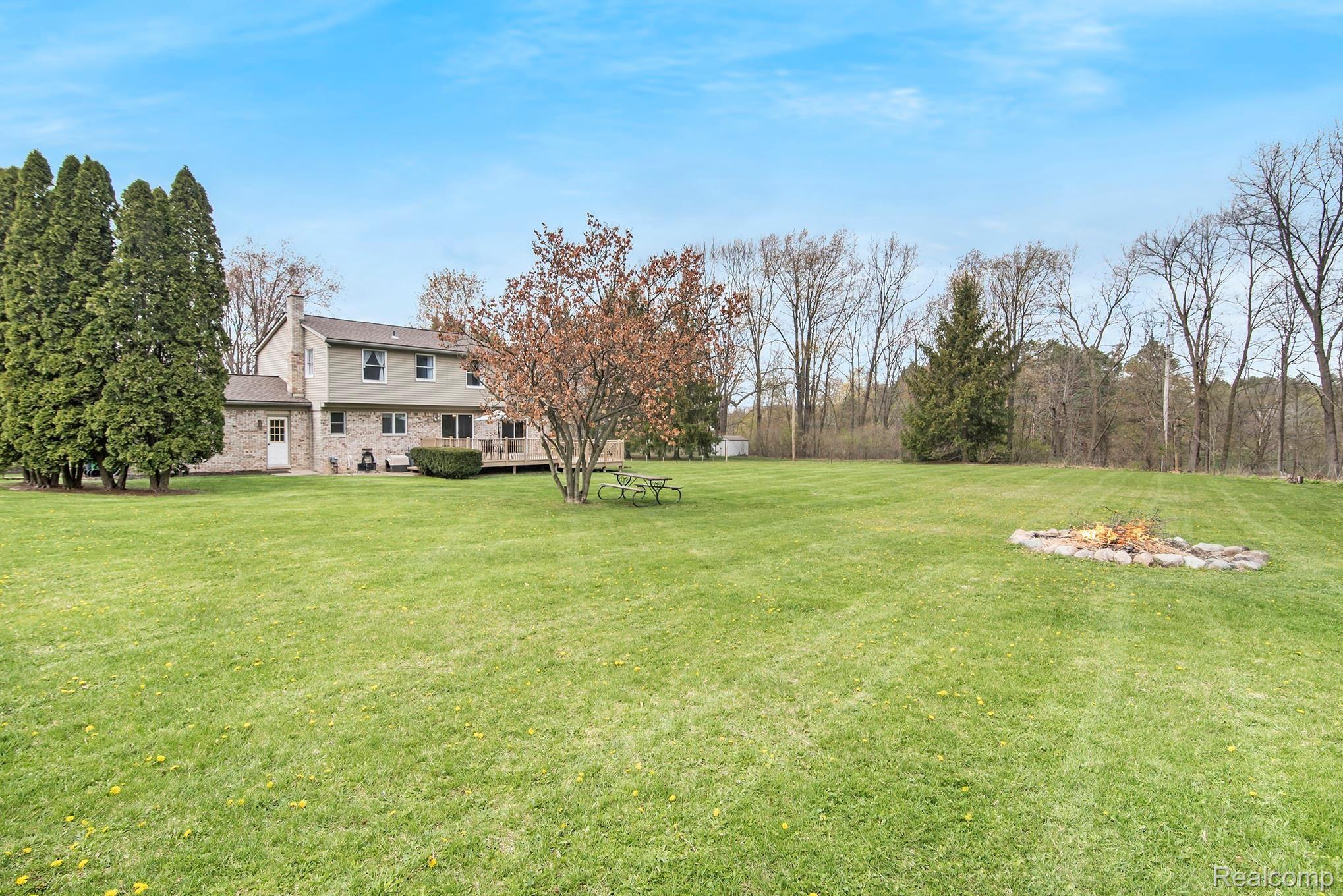 1860 Echo Hills Road Howell, MI 48855 - Photo 19 of 25 enjoy all the privacy that 1.7 acres affords