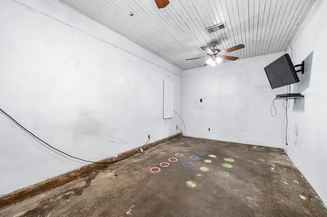 a view of a livingroom with a flat screen tv