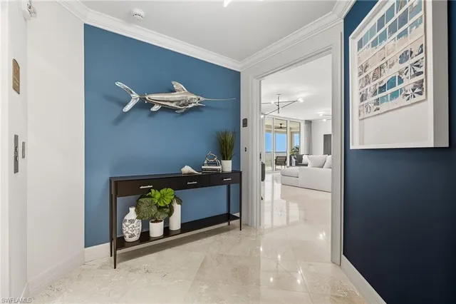 a view of living room with furniture and a fireplace
