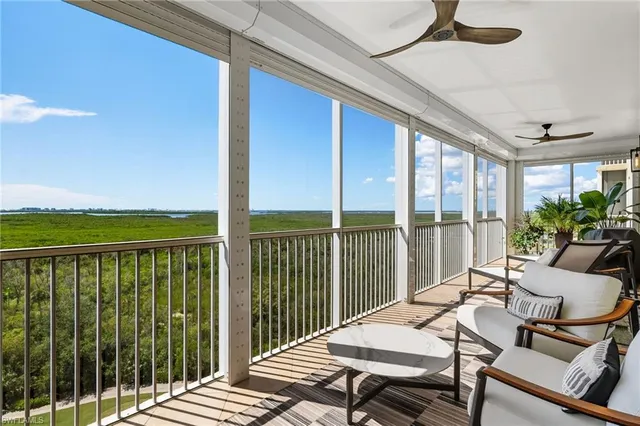 a balcony with furniture