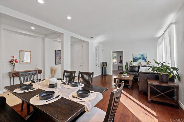 a kitchen with counter top space cabinets and appliances