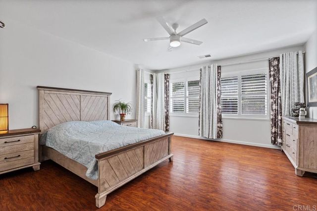 a front view of a house with outdoor space and sitting area