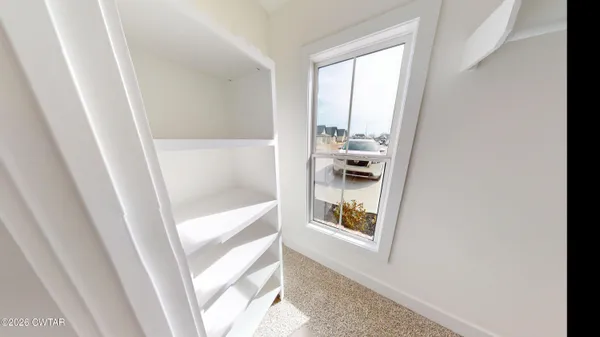 a view of a bathroom with shower