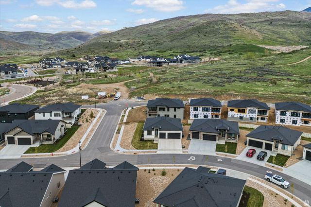 3349 Oxford Loop Morgan, UT 84050 - Photo 41 of 47 Aerial view of residential area featuring a mountain backdrop