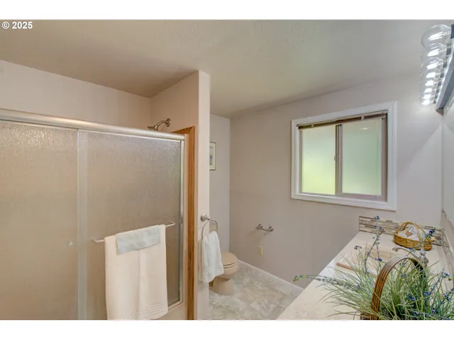 a view of a bedroom with window