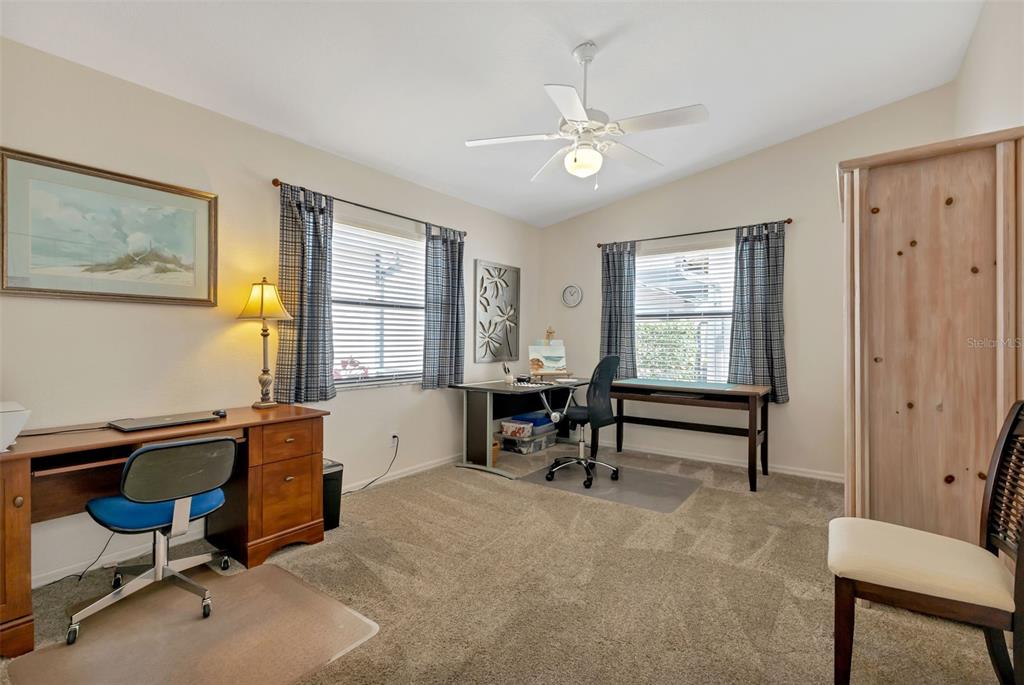 5036 San Rocco Court Punta Gorda, FL 33950 - Photo 3 of 13 a view of a workspace with furniture and a window