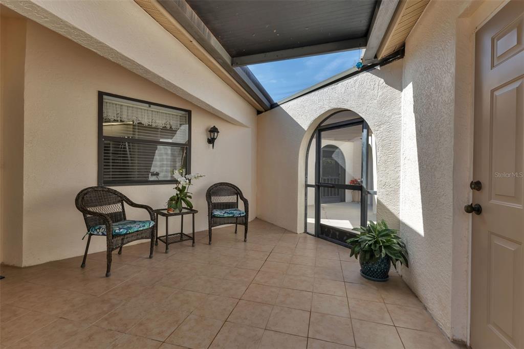 5036 San Rocco Court Punta Gorda, FL 33950 - Photo 9 of 13 a view of swimming pool with outdoor seating