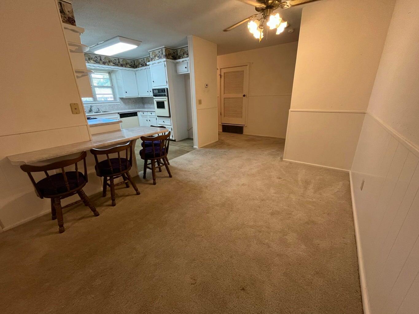 2009 Dallas Plainview, TX 79072 - Photo 9 of 26 a kitchen with a table and chairs in it
