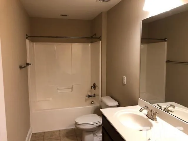 an empty room with shelves