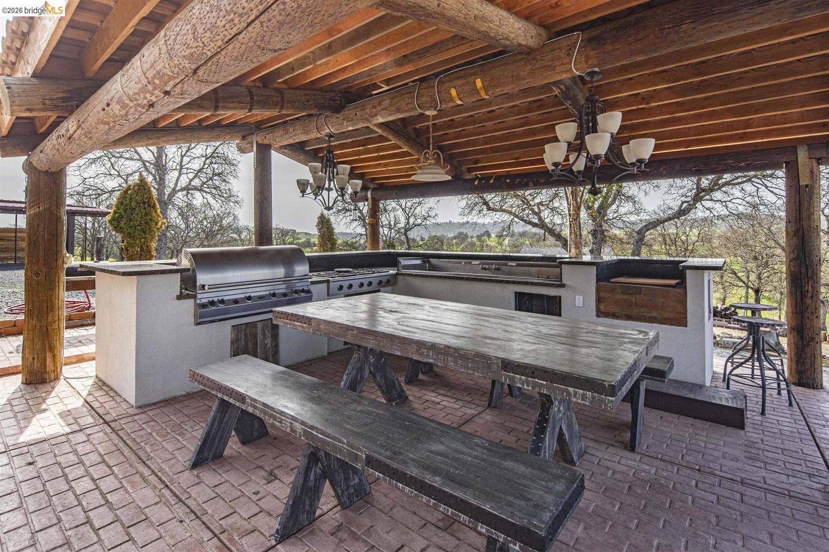 4626 Little John Road Copperopolis, CA 95228 - Photo 2 of 53 a view of a chairs and table in the patio