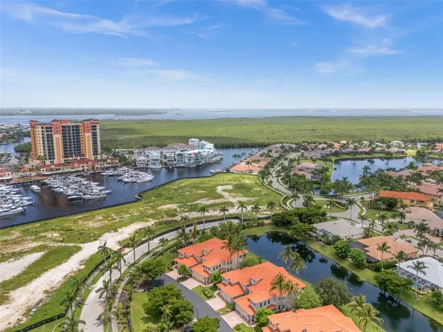 $475,000 | 5626 Cape Harbour Drive, Unit 102, Cape Coral, FL 33914