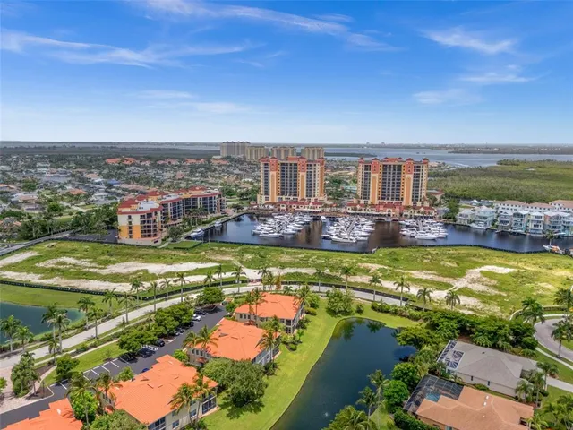 $475,000 | 5626 Cape Harbour Drive, Unit 102, Cape Coral, FL 33914