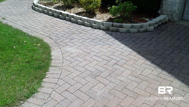 7020 Rocky Rd Loop Gulf Shores, AL 36542 - Photo 3 of 29 stone paver driveway