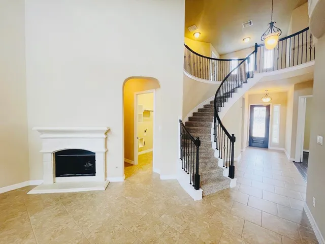 a view of an entryway with a fireplace