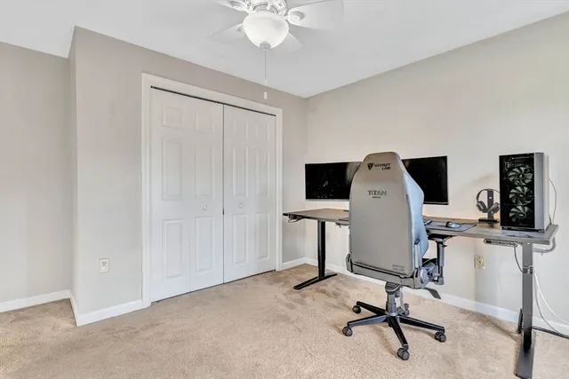a view of a workspace with furniture