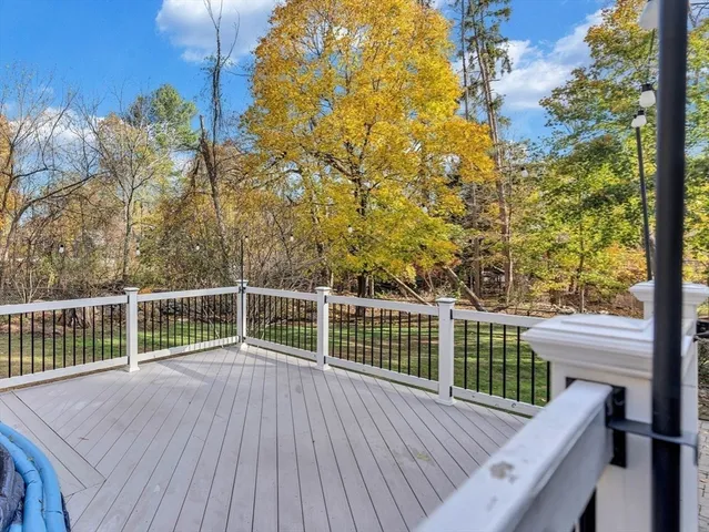 a view of a balcony with wooden floor