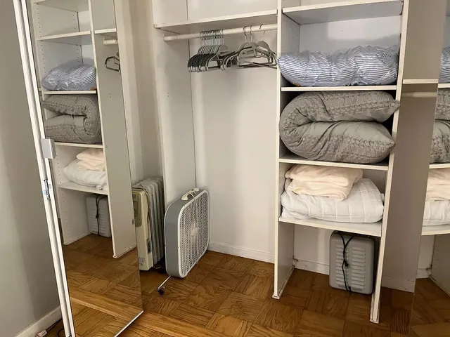 a front view of a building with a lot of windows