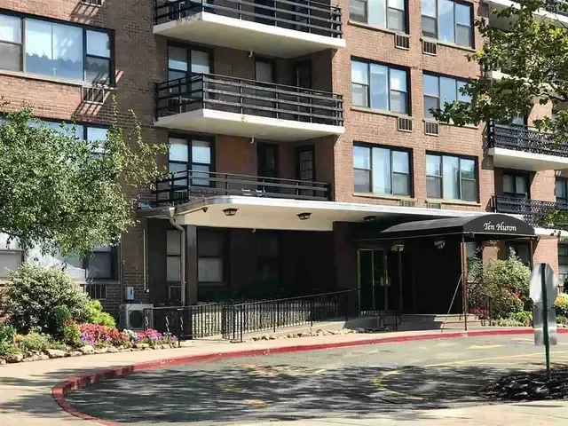 a view of a city with tall buildings in the background