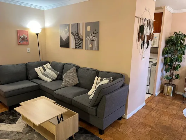 a living room with furniture and a couch