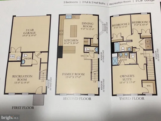 a view of a city with large trees