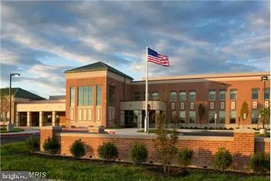 a view of a house with a swimming pool