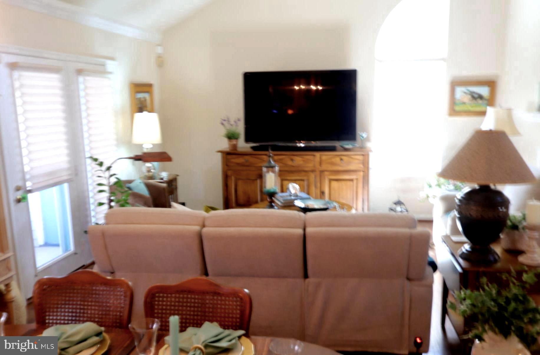 118 Primrose Lane Reading, PA 19610 - Photo 12 of 36 a living room with furniture and a flat screen tv