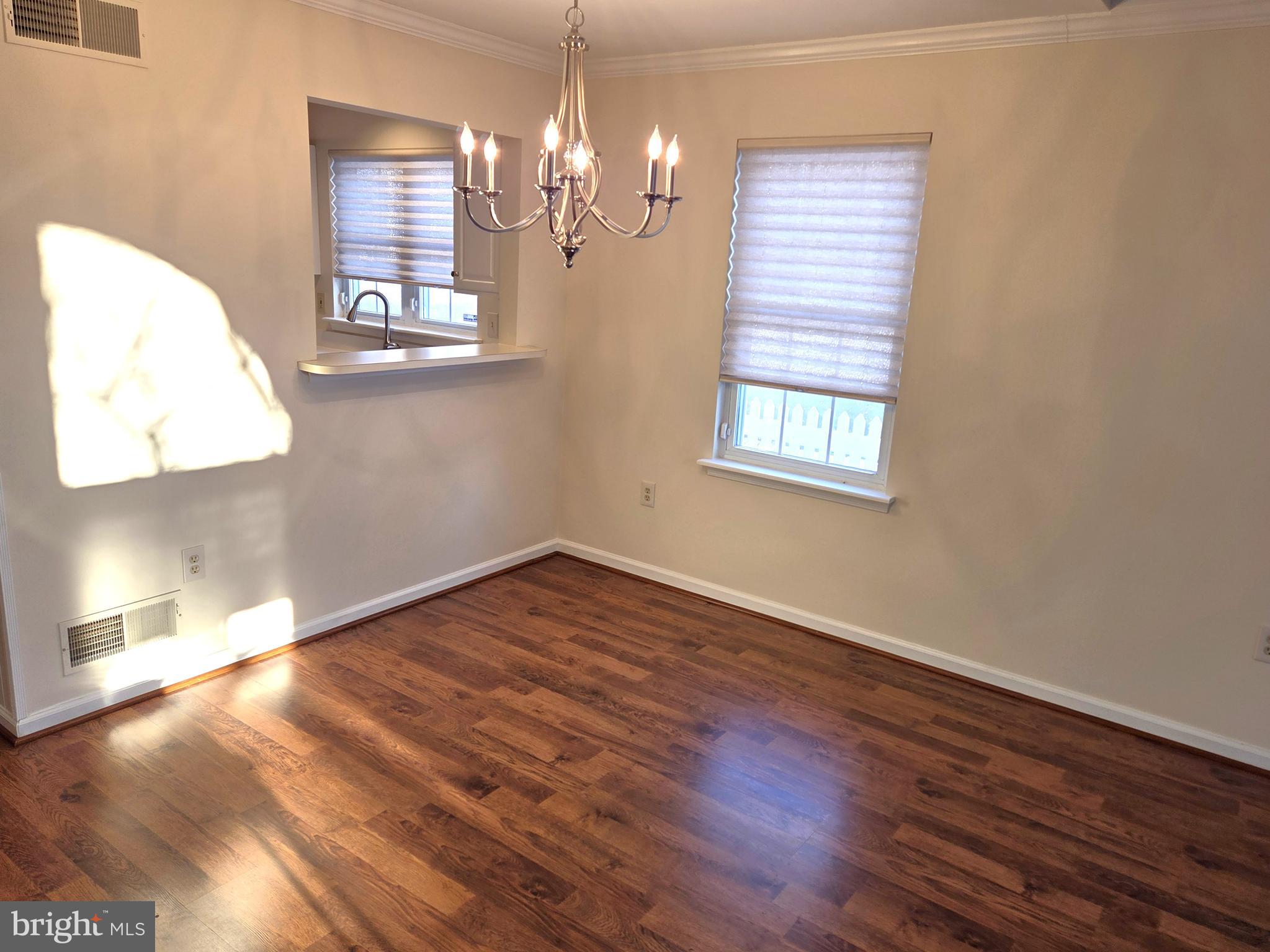 118 Primrose Lane Reading, PA 19610 - Photo 7 of 36 wooden floor in an empty room with a window