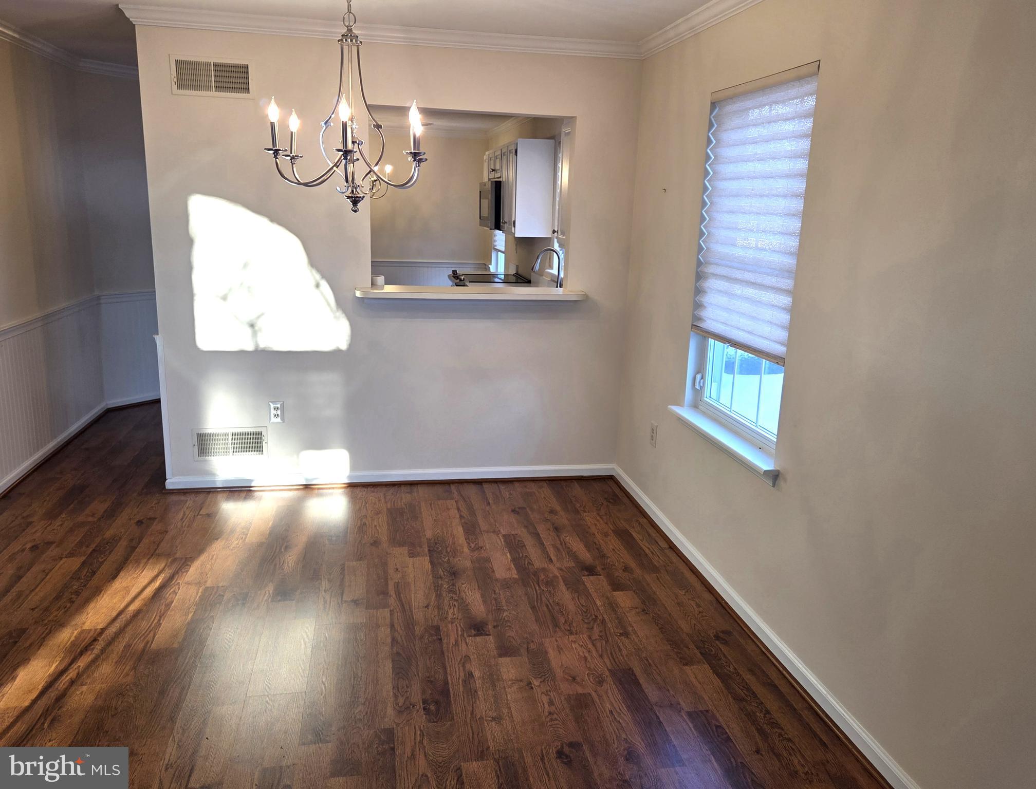 118 Primrose Lane Reading, PA 19610 - Photo 8 of 36 a view of a room with wooden floor and staircase