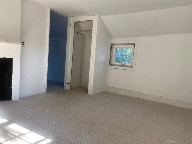 an empty room with windows